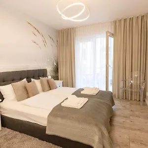 apartament-przy-latarni-morskiej.kolobrzeghotels.com/